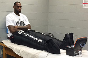 Lebron James getting treatment with NormaTec compression therapy